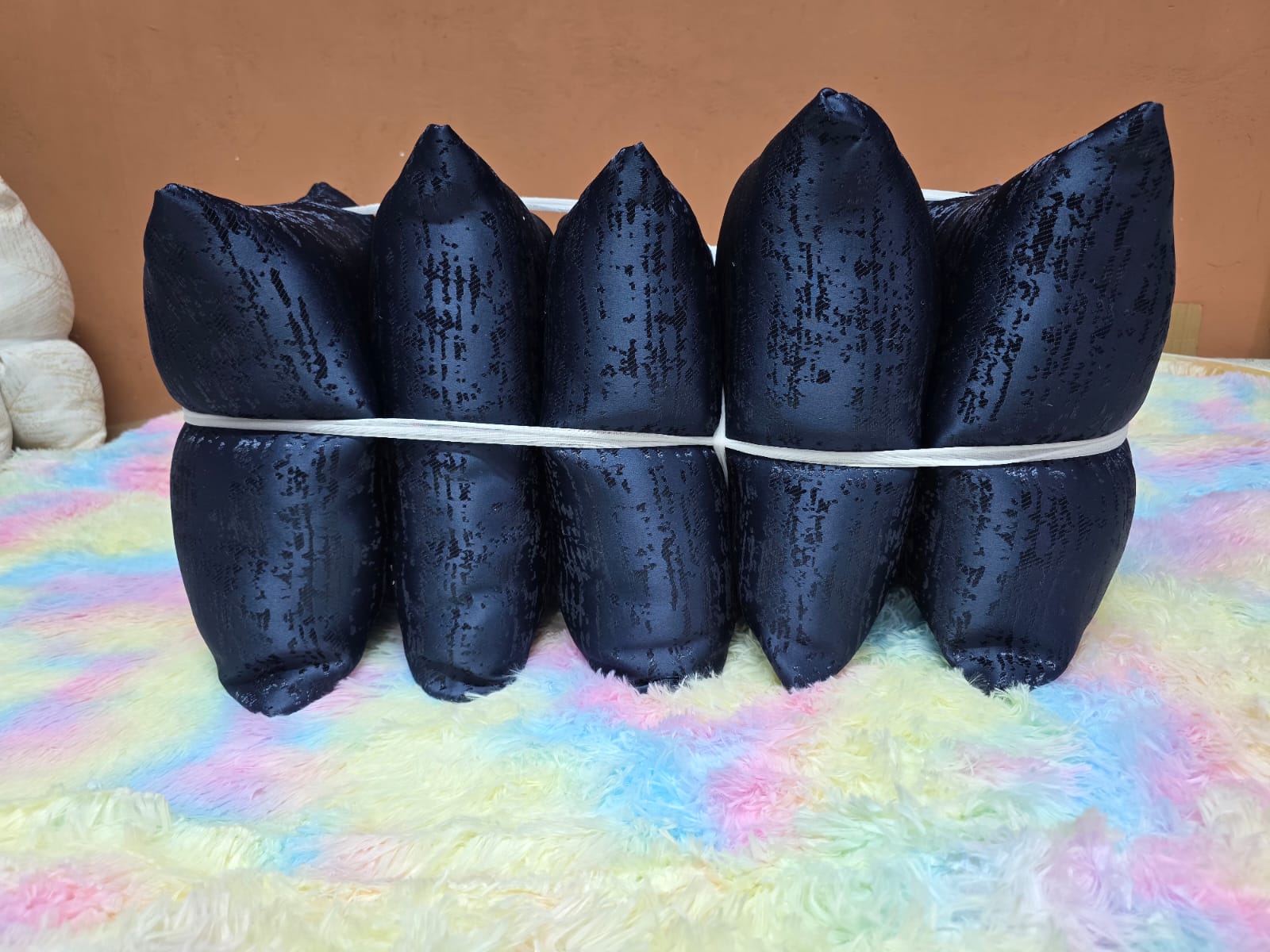 A Set of 5 Fiber Throw Pillows